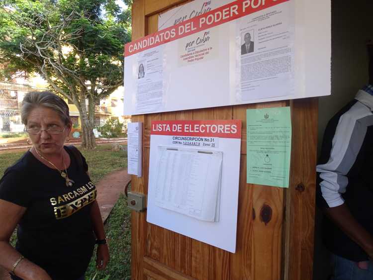 Resident consults voter lists.